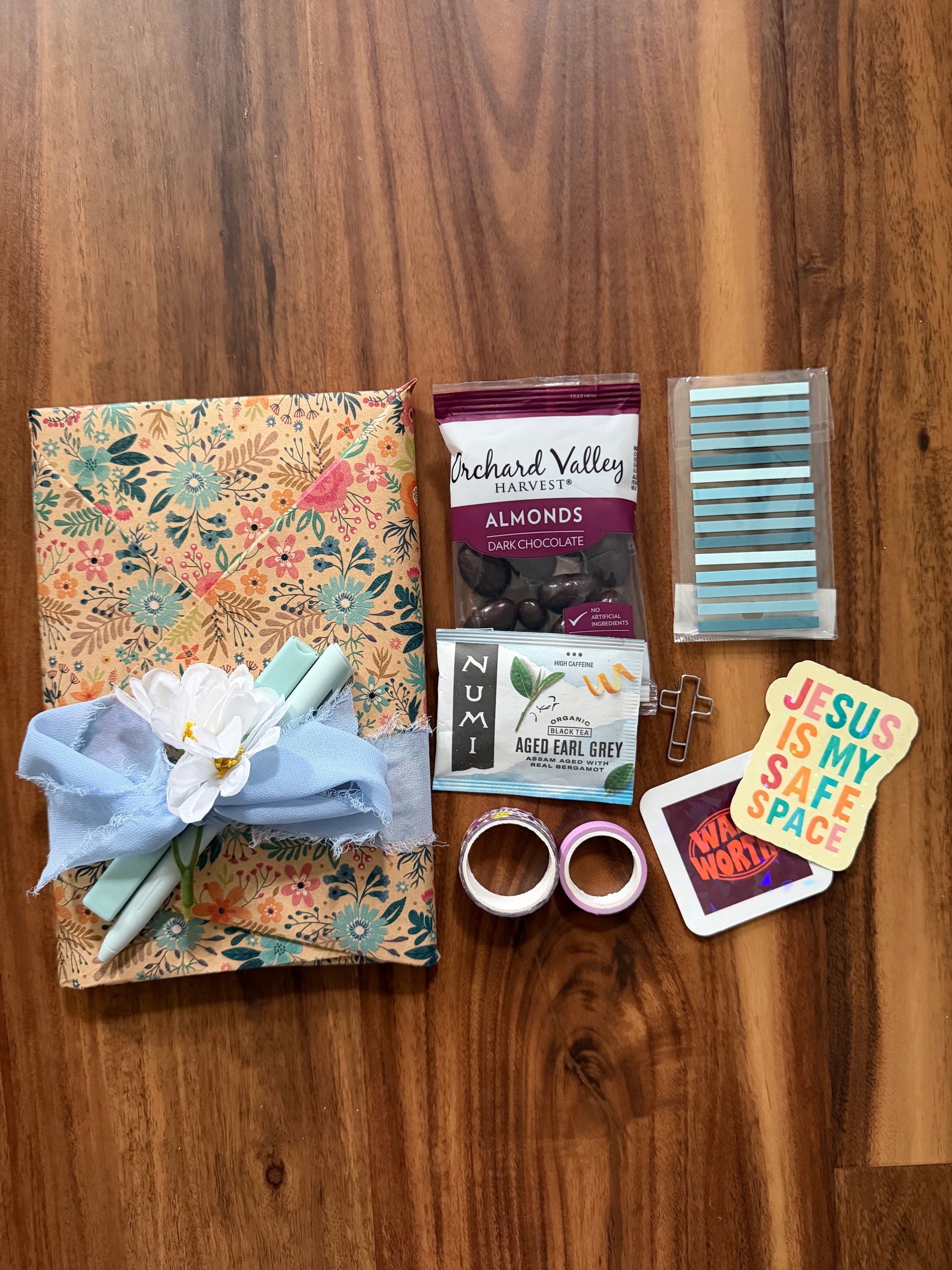 Surprise book titled "Blind Date with Jesus" devotional edition by Sons & Daughters, featuring a wrapped gift-style cover.