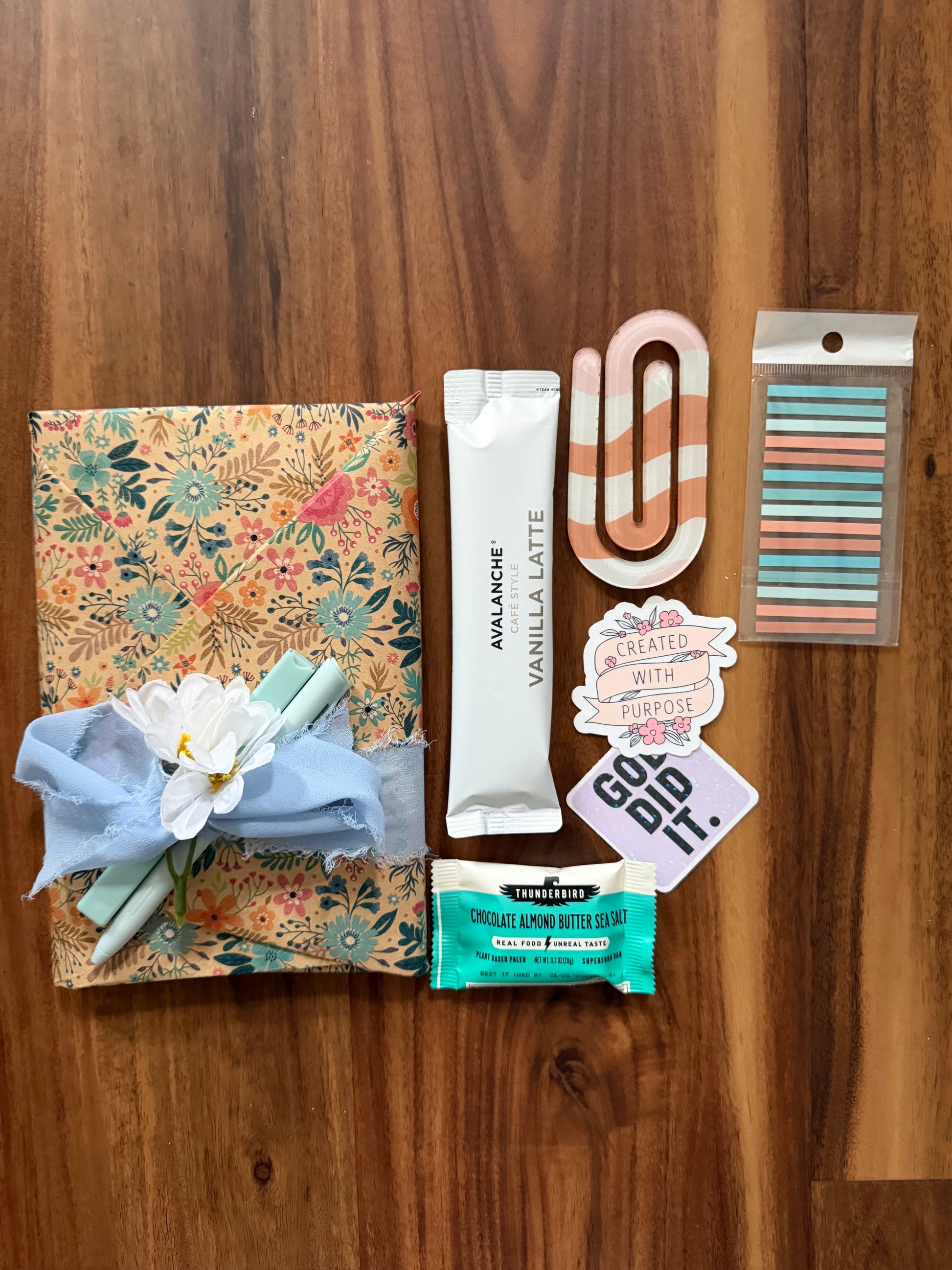 Surprise book titled "Blind Date with Jesus Devotional" by Sons & Daughters, featuring a wrapped gift package with decorative ribbon.
